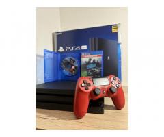 PlayStation 4 Pro 1TB + igre + škatla
